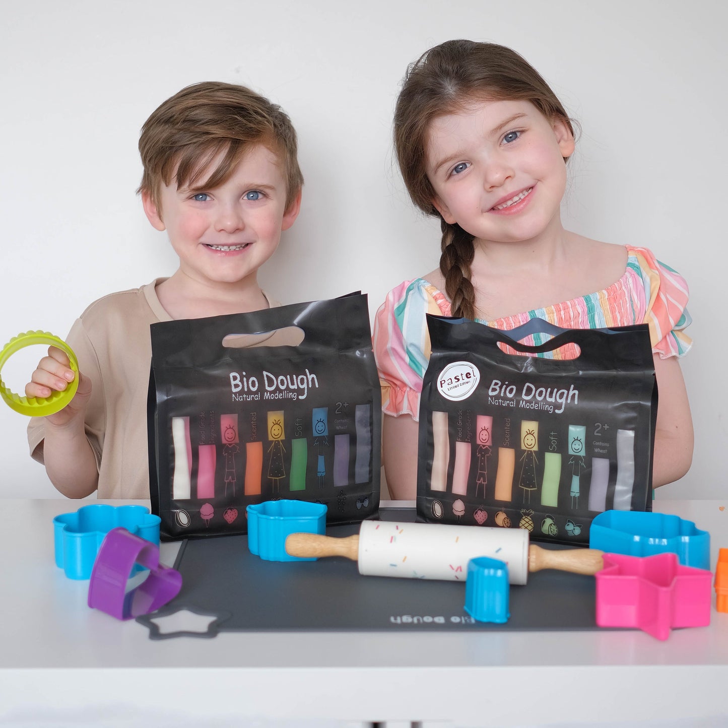 Kids enjoying Bio DoUgh Rainbow Double Pack sensory play