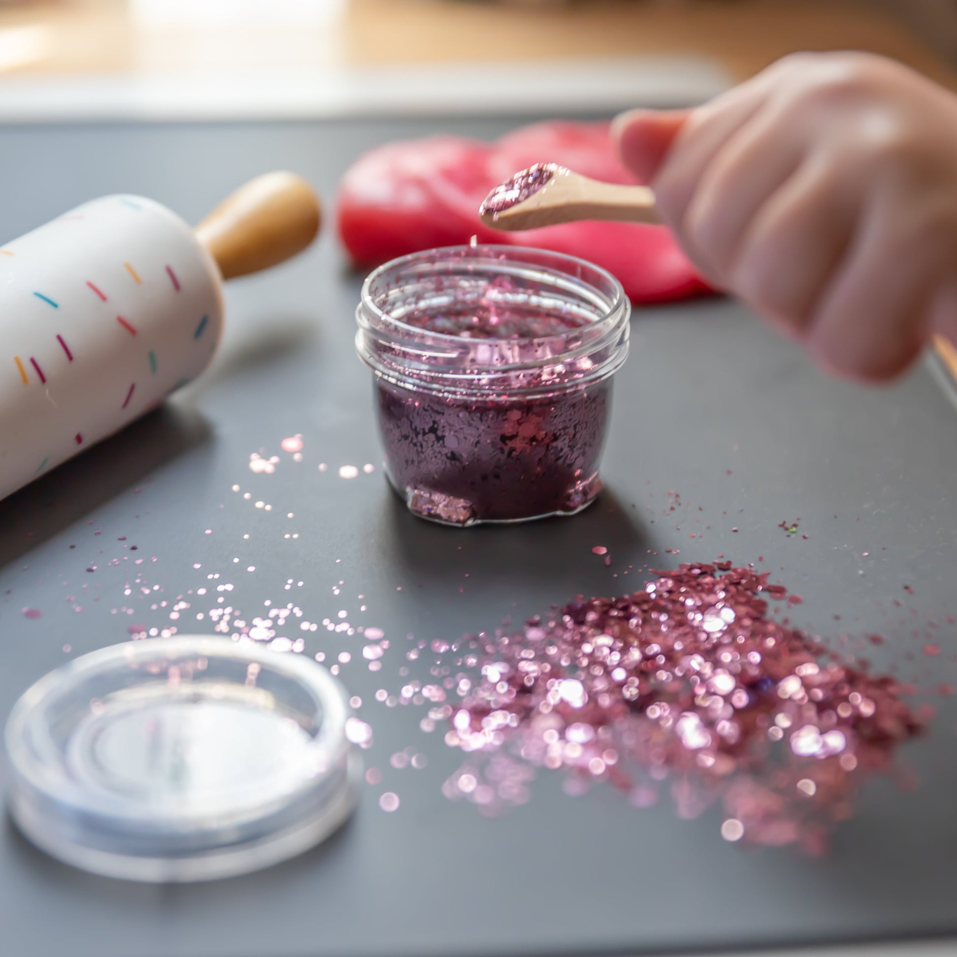 Sparkly eco glitter sprinkled on playdough