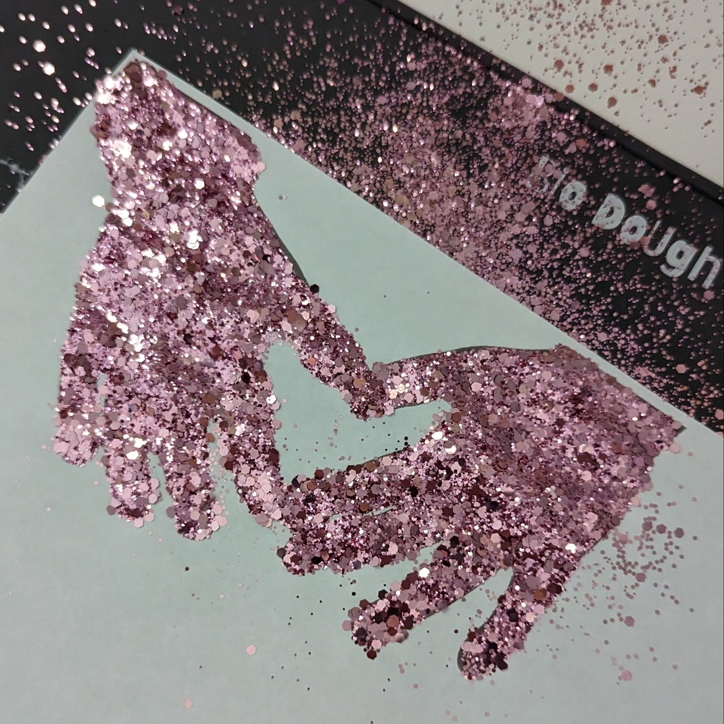 Dusty Pink Glitter showing kids hands on paper
