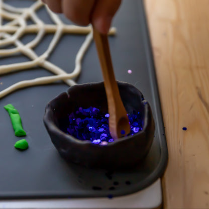 Close-up of electric glitter Bio DoUgh showing sparkly texture