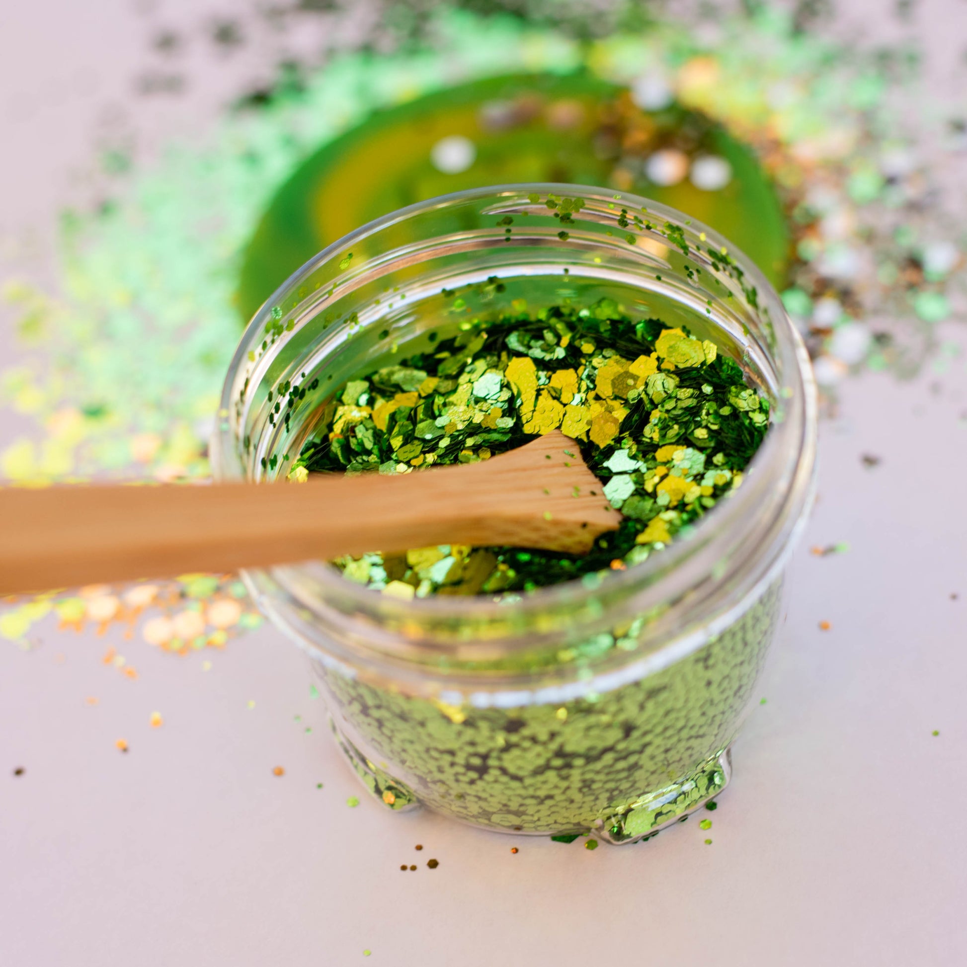 Close-up of green glitter Bio DoUgh showing sparkly texture