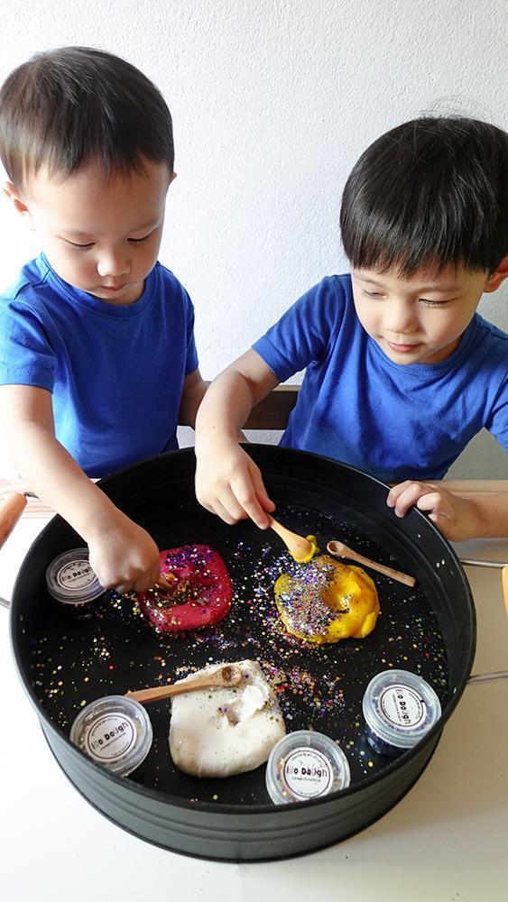 Kids playing with our Marine Mix Glitter