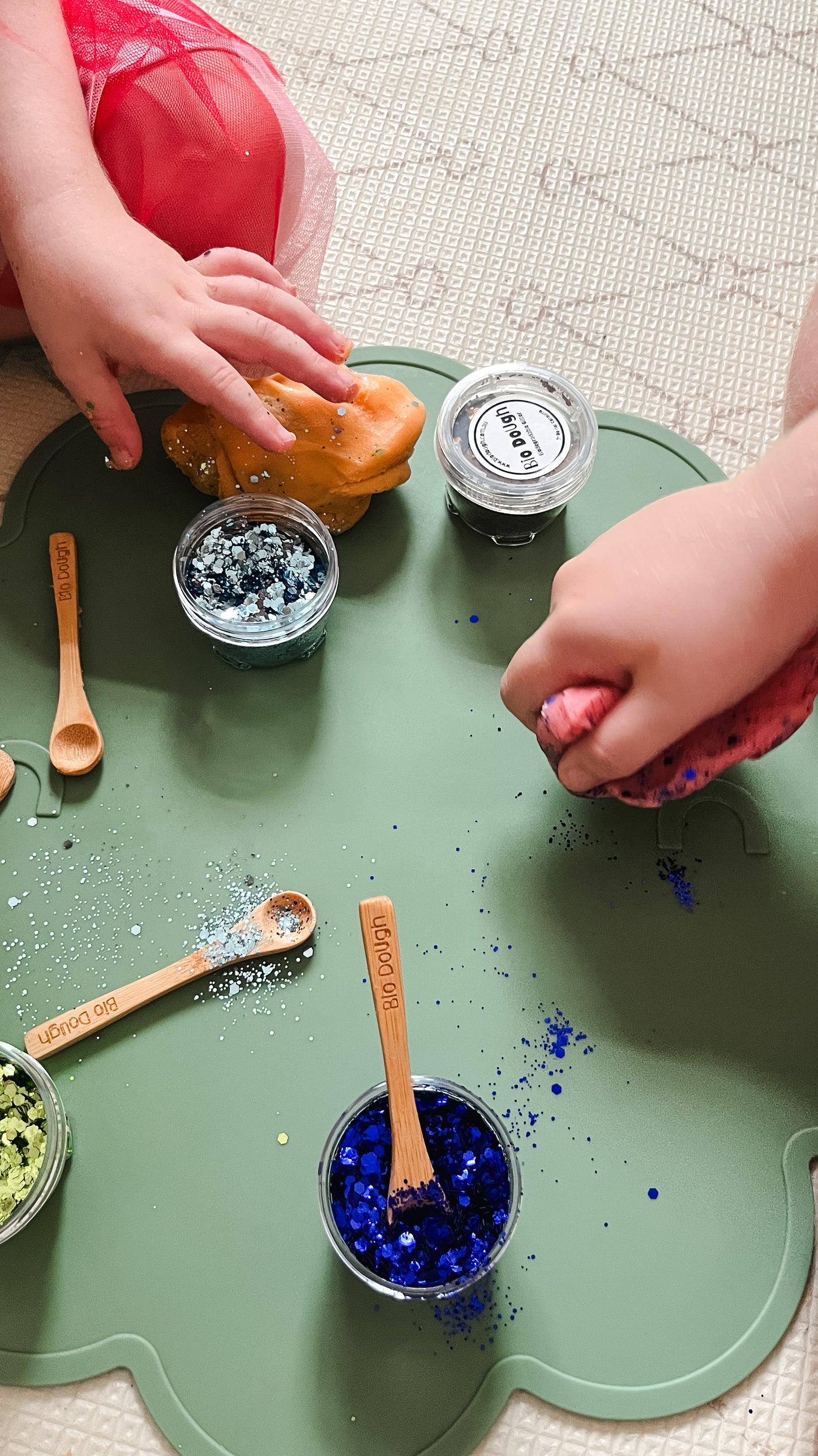 Close-up of marine mix glitter Bio DoUgh showing sparkly texture