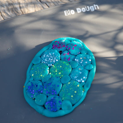 Close-up of eco-friendly sky mix glitter in jar for kids crafts