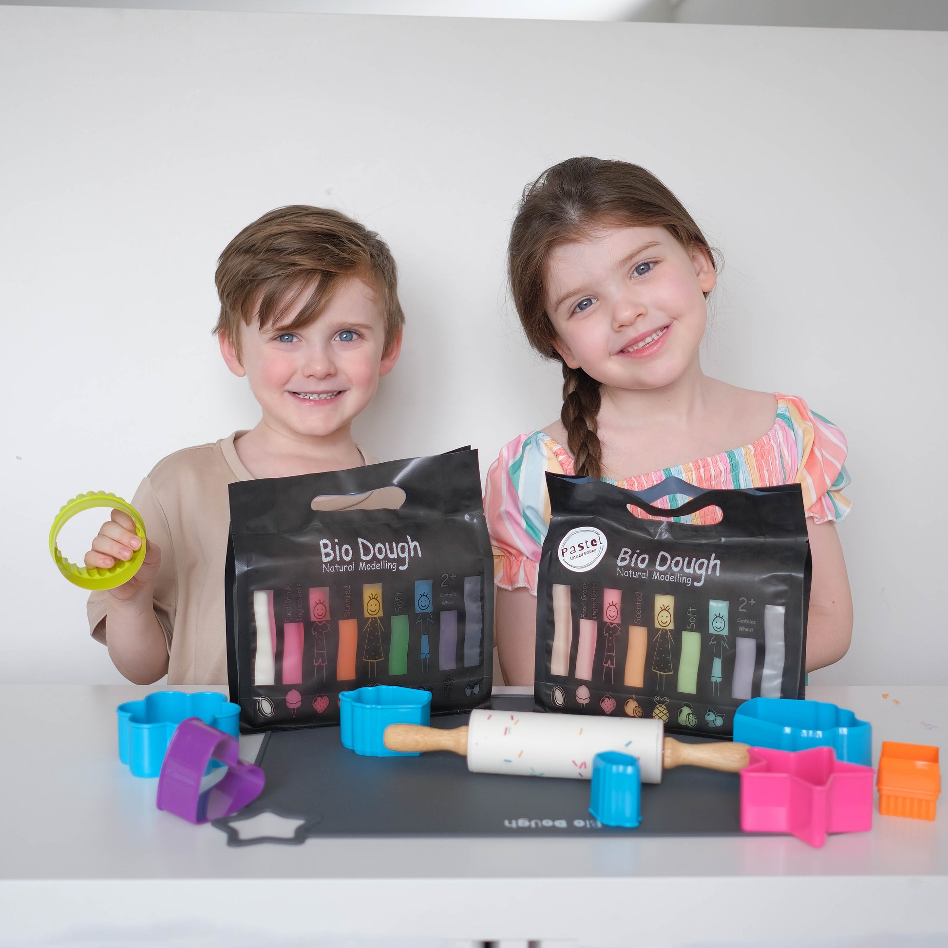 Kids enjoying Bio DoUgh Rainbow Double Pack sensory play