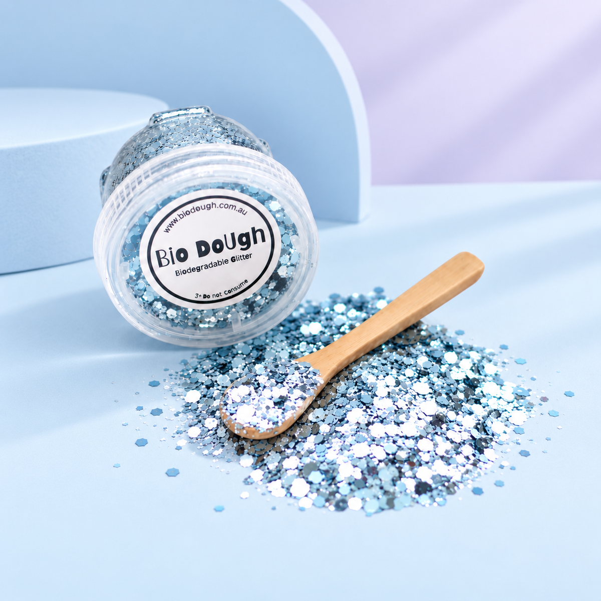 Blue biodegradable Bio DoUgh glitter with bamboo spoon for playdough and sensory play