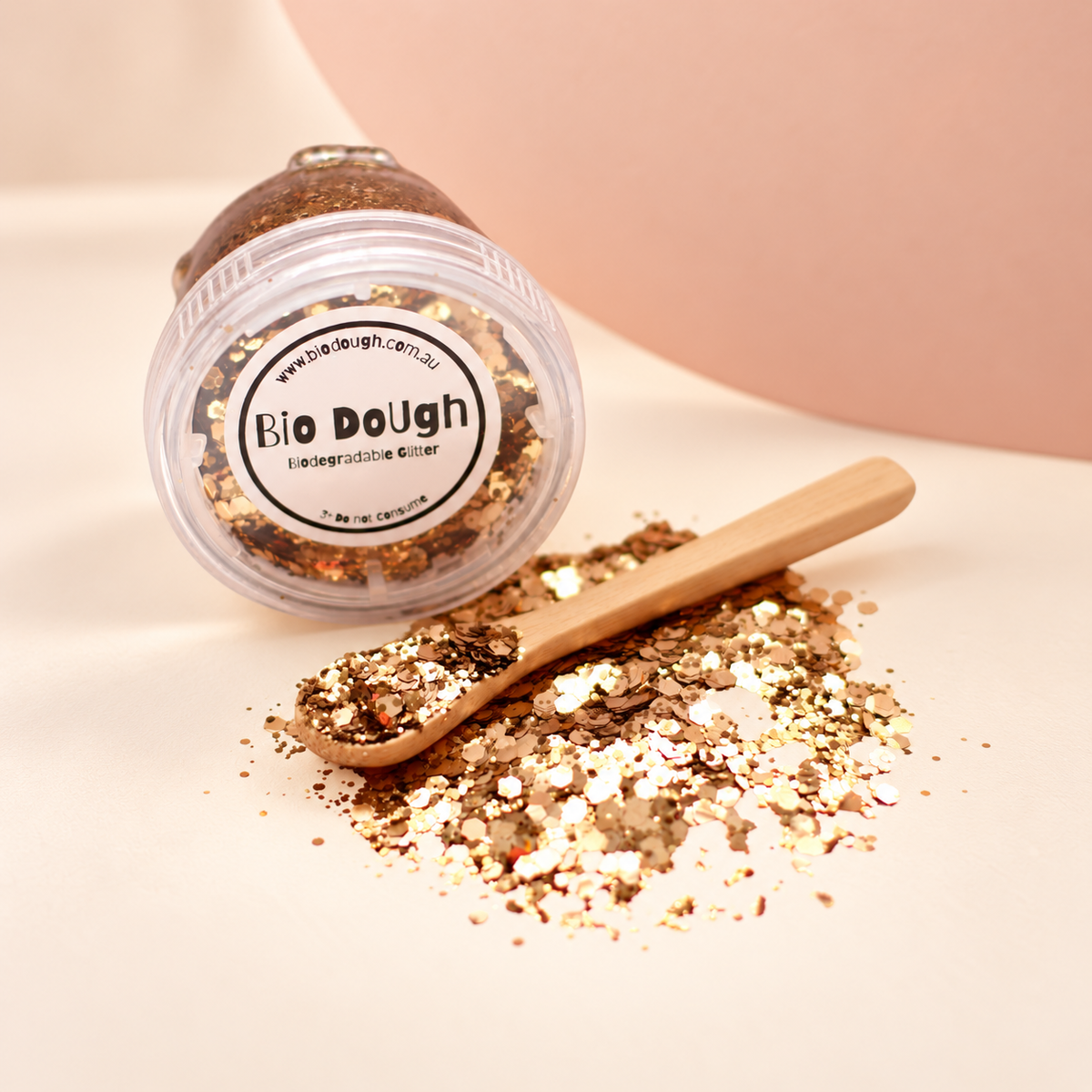 Golden biodegradable Bio DoUgh glitter with bamboo spoon for playdough and sensory play