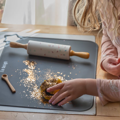Close-up of golden glitter Bio DoUgh showing sparkly texture