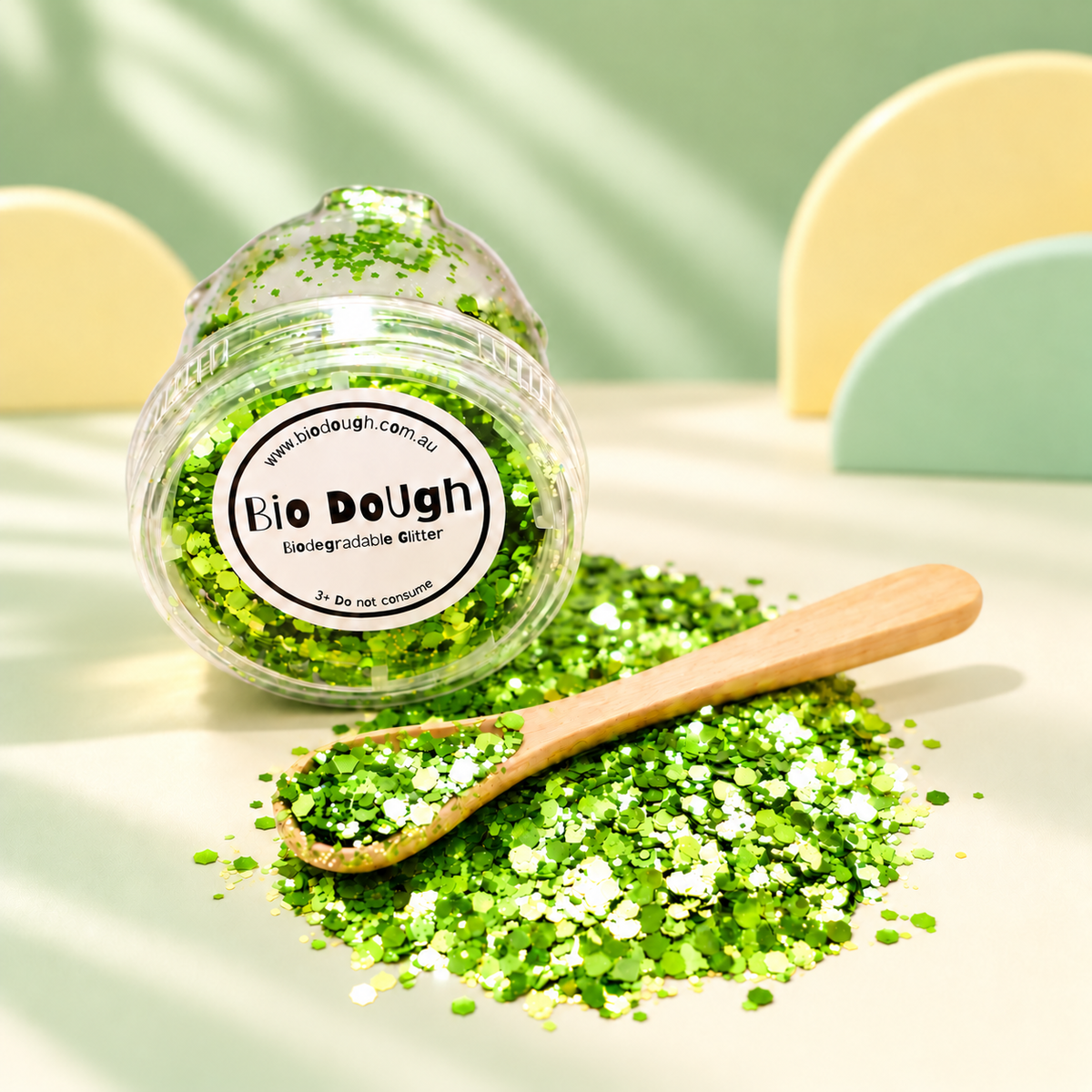 Green biodegradable Bio DoUgh glitter with bamboo spoon for playdough and sensory play