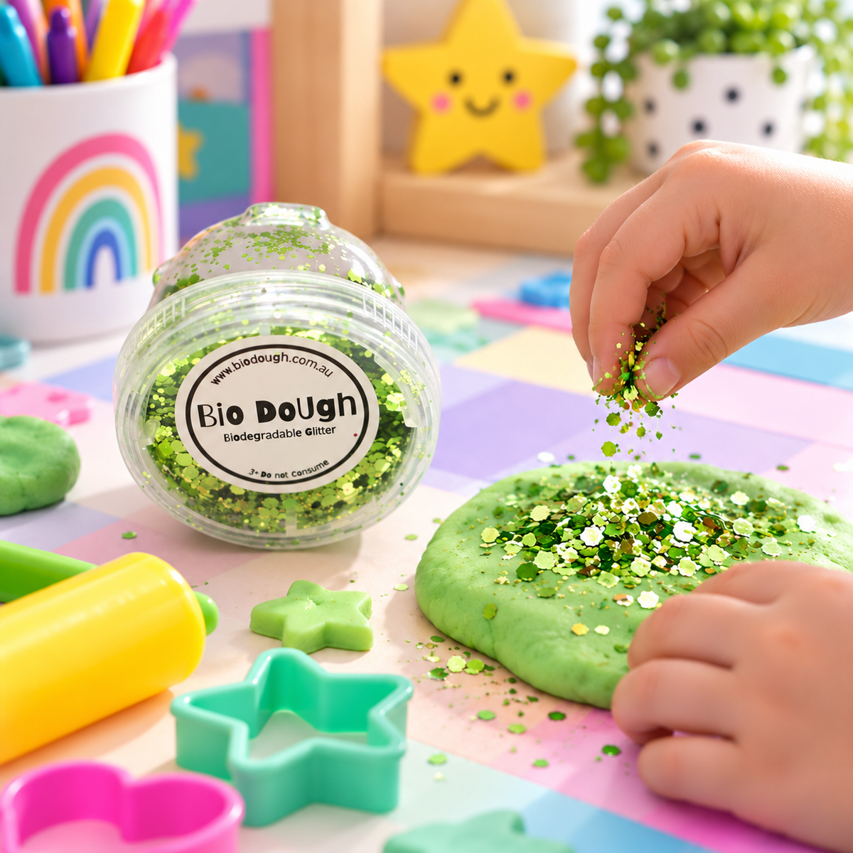 Green eco-friendly glitter with Bio DoUgh playdough and colourful cutters for creative play