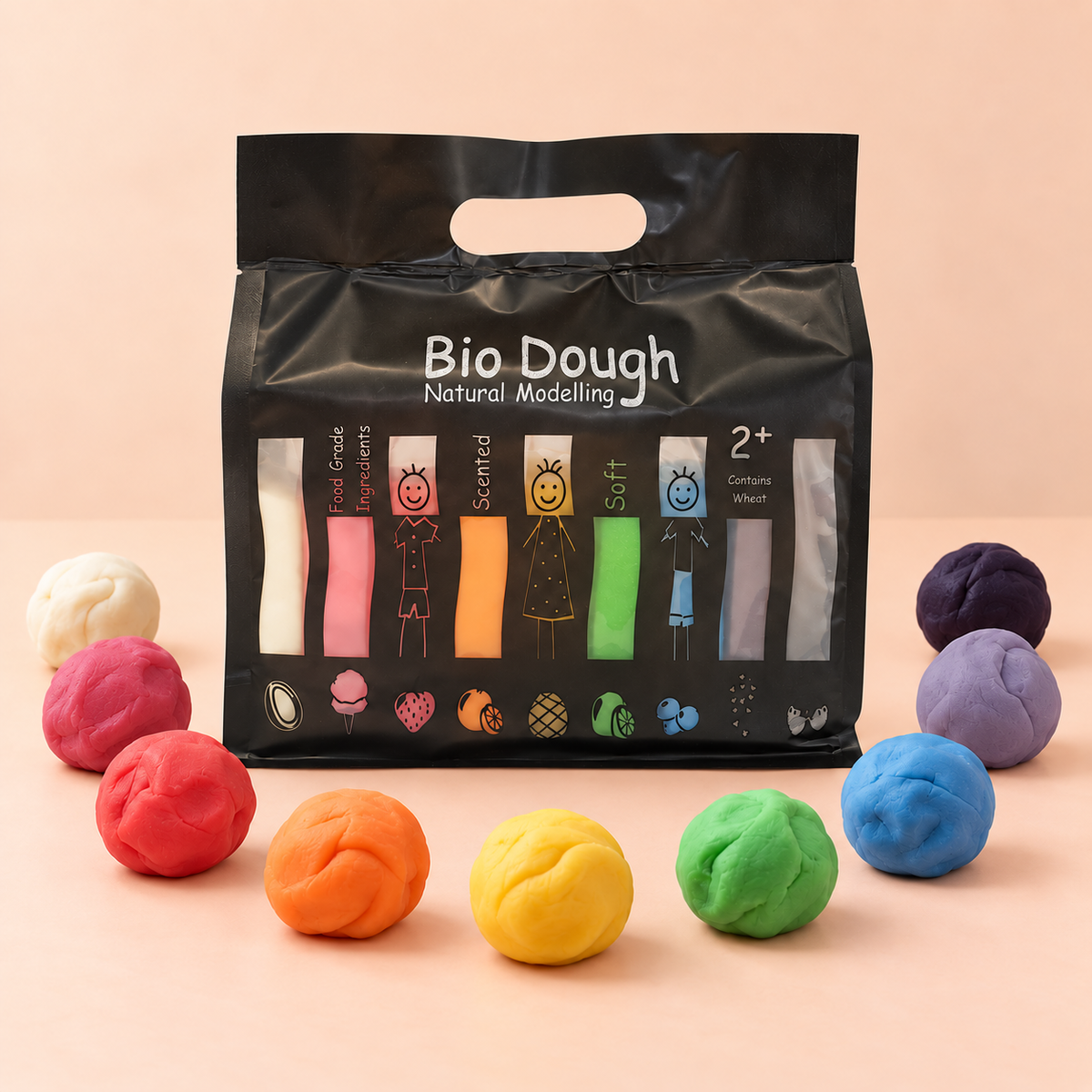Bio Dough Natural Modelling clay kit in a black resealable bag, surrounded by multiple colorful dough balls in white, pink, red, orange, yellow, green, blue, and purple on a peach background.