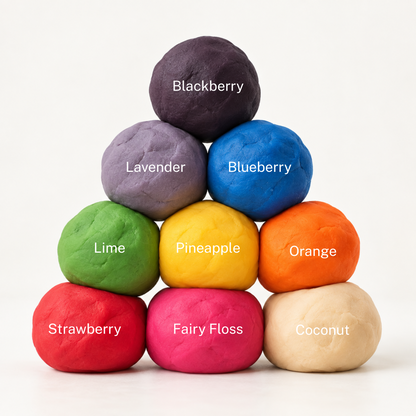A pyramid of colorful fruit-flavored gum balls labeled with names like Blackberry, Lavender, Blueberry, Lime, Pineapple, Orange, Strawberry, Fairy Floss, and Coconut on a clean white background.