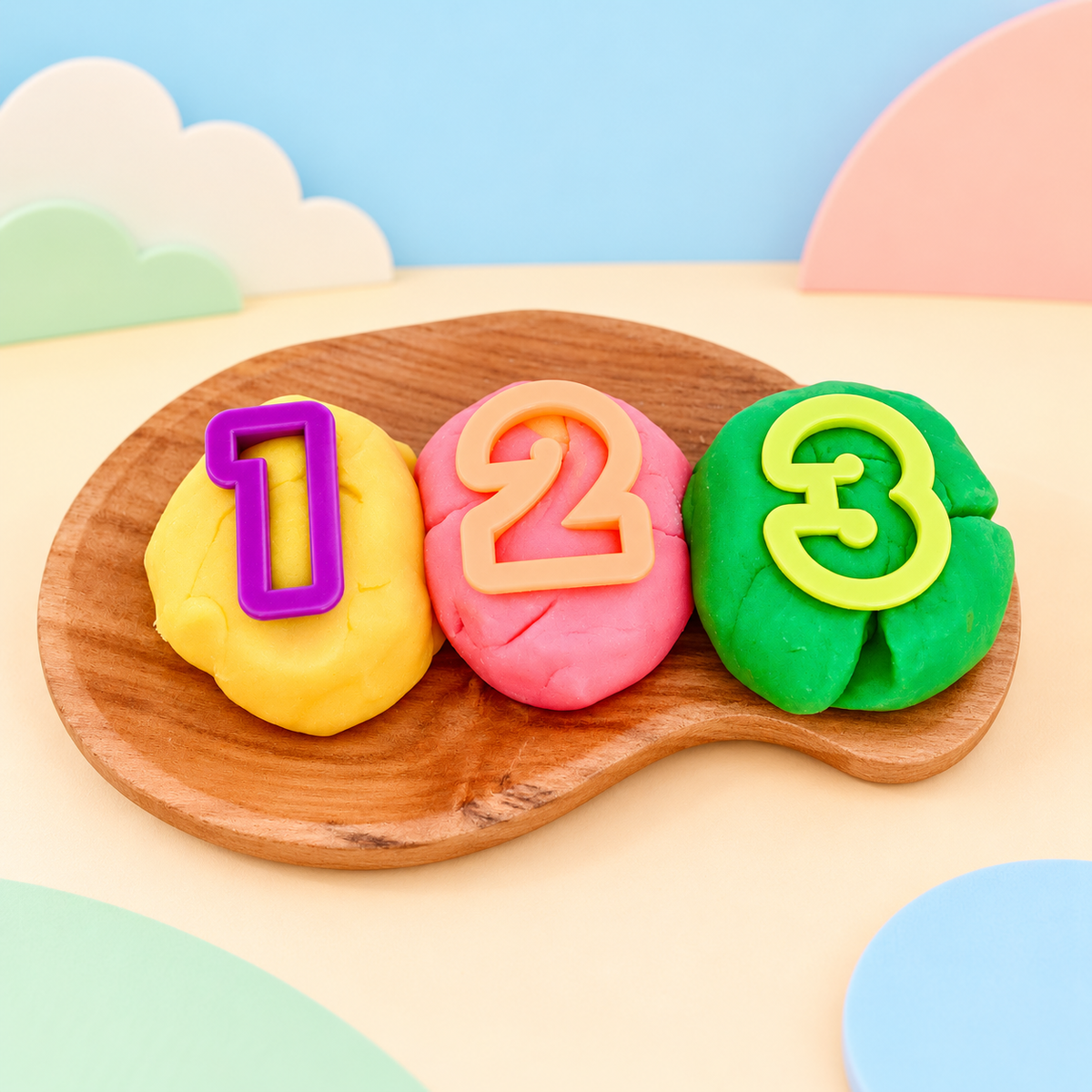 Bio DoUgh number cutters creating colourful 1, 2 and 3 shapes in playdough for counting activities