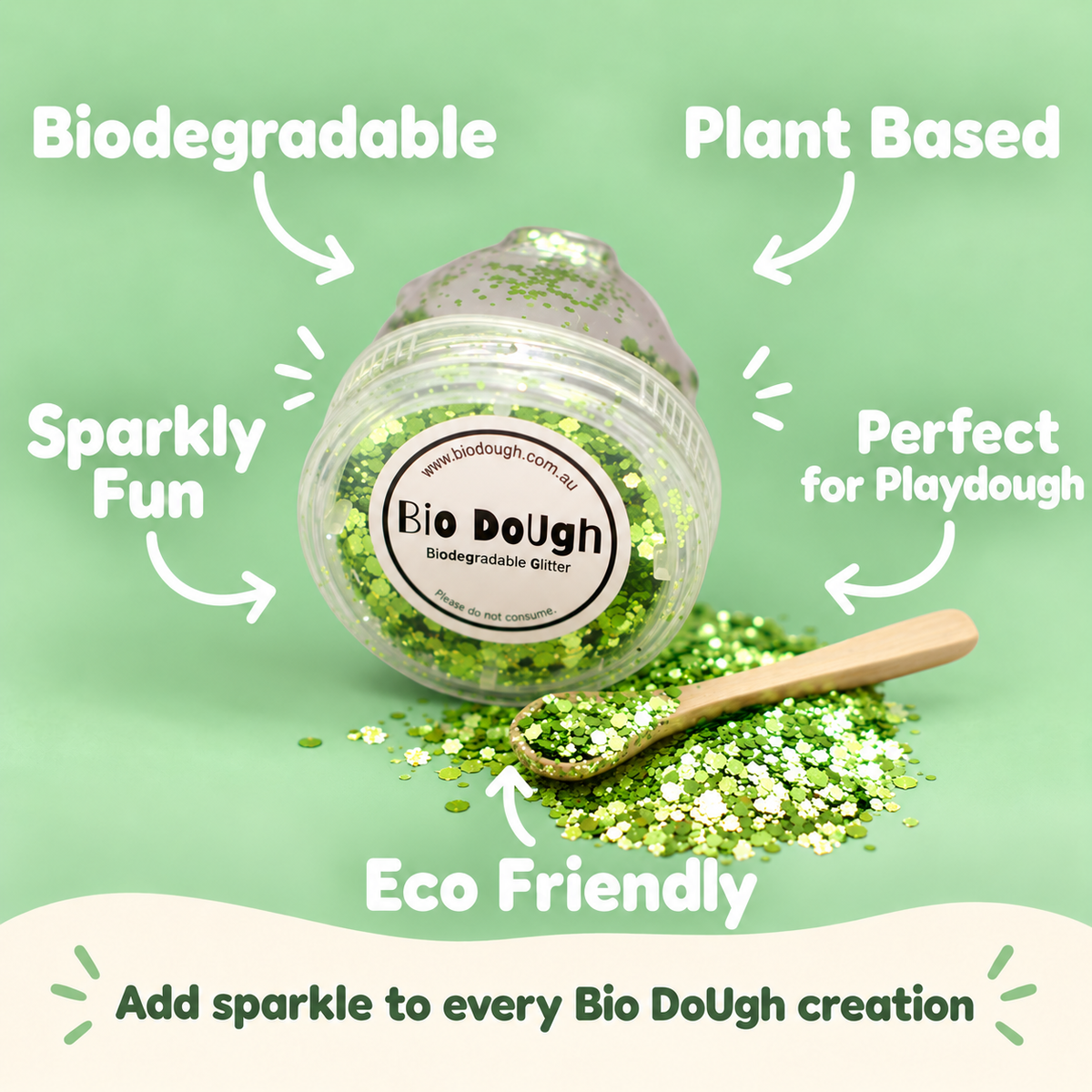 A clear jar of green and white Bio DoUgh biodegradable glitter with a wooden spoon of spilled glitter on a light green background, surrounded by promotional text highlighting eco-friendly and playful features.