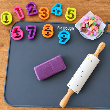 Bio DoUgh number cutters and colourful playdough arranged for counting and number learning activities